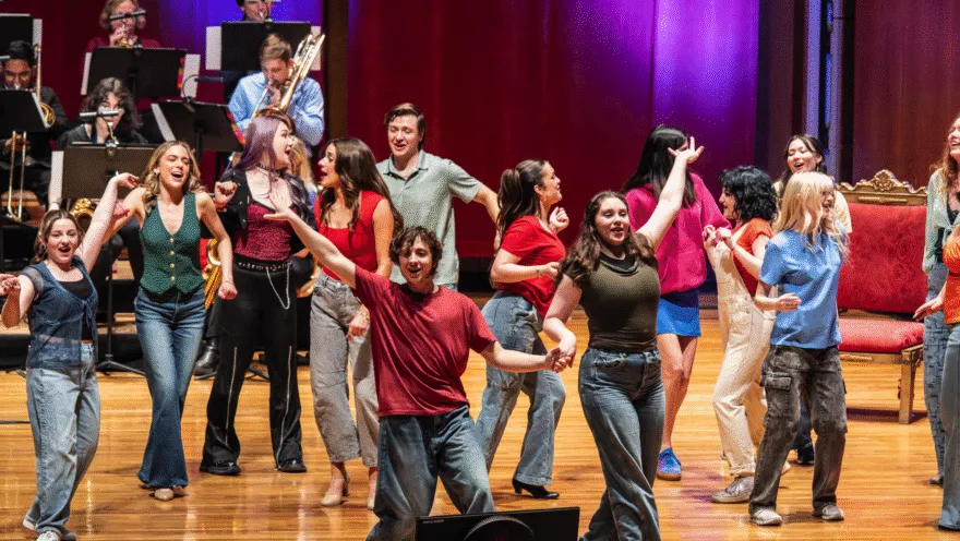 Performers dancing on stage 